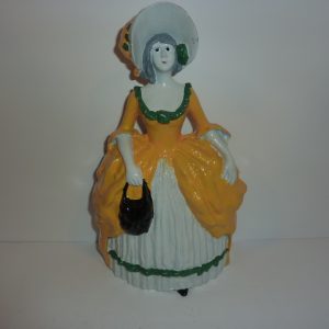 (66) DOOR STOP -  LADY WITH PURSE