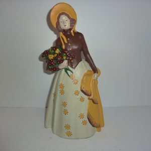(68) DOOR STOP - LADY WITH FLOWER BASKET